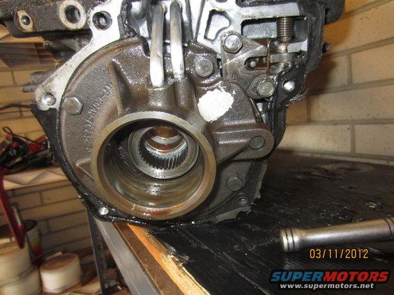 Close-up of a transmission component with splined input shaft visible