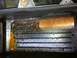 1990 Ford Bronco - Close-up view of a dirty engine oil filter housing with visible oil and debris.