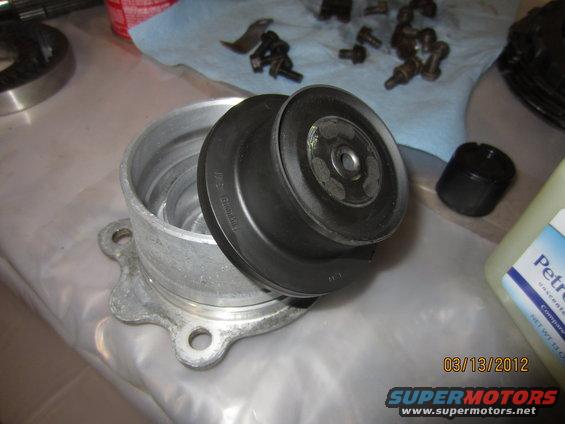 Pulley and housing assembly on a workbench
