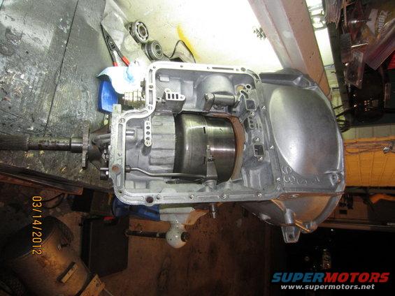 Disassembled transmission housing with internal components visible