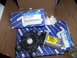 2003 Hyundai Tiburon - Hyundai window motor part in a cardboard box with other parts.