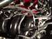 1987 Ford Bronco - Engine intake manifold and associated wiring harness components are shown in detail.