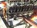 1992 Ford Bronco - The engine's valve train is exposed, with rocker arms and springs visible.