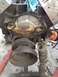 1992 Ford Bronco - The engine block is exposed with the water pump assembly removed, revealing internal wear and corrosion.