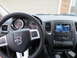 2012 Dodge Durango - The interior of a 2012 Dodge Durango showcases its dashboard, steering wheel, and central infotainment system.