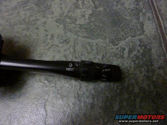 Black wiper stalk with 'MIST' and speed settings (OFF, INT, L, M, H)