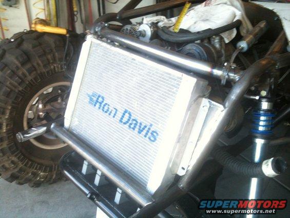 Off-road buggy radiator with 'Ron Davis' text and large tire