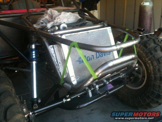 Custom buggy rear suspension and radiator with "on Davis" text visible