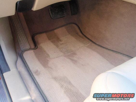 Interior floor mat with Jaguar logo