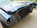 1973 Chevrolet Camaro - Front view of a 1973 Chevrolet Camaro with its grille removed and hood damaged.
