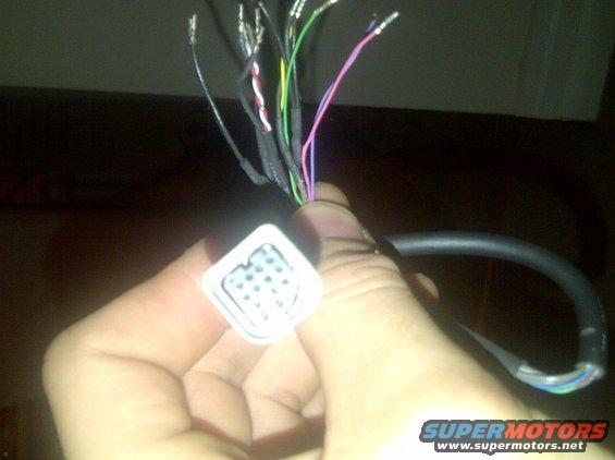 unknown-13-pin-female.jpg this is the factory radio harness for the 2000.

apparently it was replaced while in service and they just left this plug behind the dash instead of throwing away