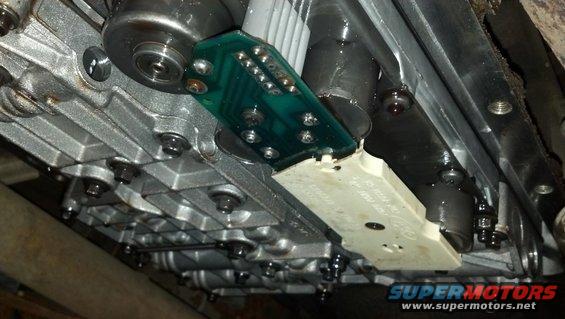 Transmission valve body with circuit board and connector