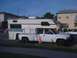 1997 Dodge 3500 - This 1997 Dodge 3500 pickup truck is equipped with a camper shell, suggesting it's set up for travel.