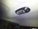 2011 Ford Ranger - The interior dome light assembly is visible against the gray headliner of the vehicle.