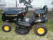 1966 Ford Bronco - This Poulan PRO riding mower features a black body with yellow accents on the wheels and deck.