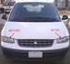 1997 Plymouth Voyager - Comparison of headlights on a 1997 Plymouth Voyager, showing the 'before' and 'after' states.