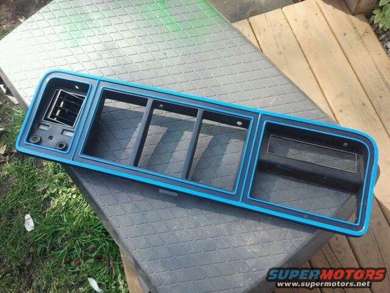 Grille assembly with blue trim and vent, likely from a Ford Bronco