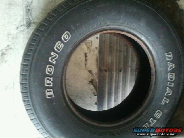 Tire with white BRONCO lettering and RADIAL GT text