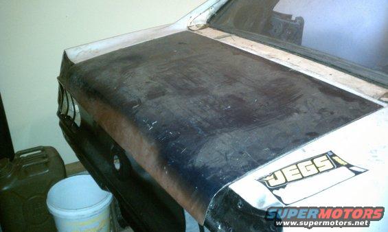 Trunk lid,  very good shape.  it has two small dents right in the center almost,  should be very easy to fix with a body hammer.  Keep in mind you cant find replacement trunk lids for a 69 coupe.