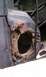 Driver side shock tower.  As you can see it was previously fixed... terribly.   The tower and the pi...