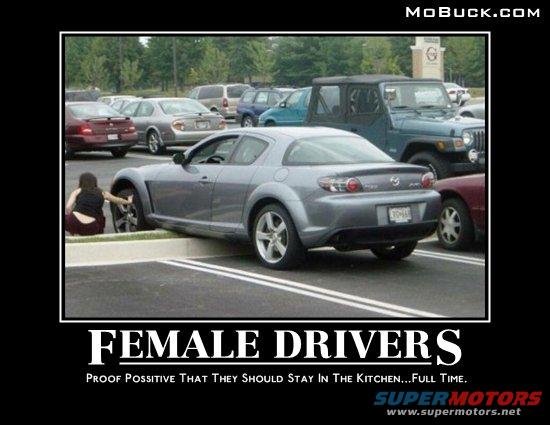 Gray Mazda RX-8 parked poorly, rear view