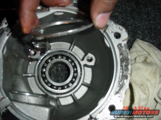 It is the backing fir the bearing....it popped right off