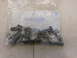 2005 Honda CR125R - A plastic bag contains a collection of bolts and fasteners, with some text visible on the packaging.