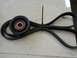 2005 Honda CR125R - A serpentine belt and its corresponding pulley are shown secured with a black zip tie.
