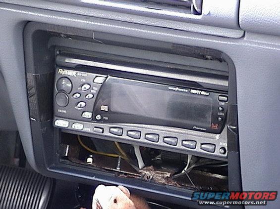 dsc00069.jpg a pioneer double din in a single din slot?!? wha??! how??!! cut it up! thats how!:)