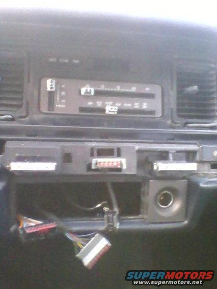 p040112_17.49.jpg Does anyone know what that plug is for?  The one between the Defroster and the power antenna switches?