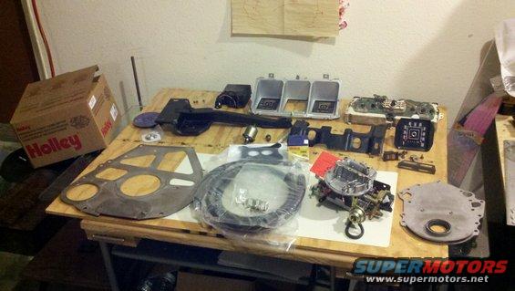 Holley box and engine parts including a carburetor and intake manifold