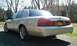 2004 Mercury Grand Marquis - A light-colored Mercury Grand Marquis is parked outdoors, showing its rear and side profile.