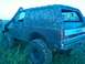 1990 Ford Bronco - This heavily muddied 1987 Ford Bronco is equipped with a snorkel and off-road tires, suggesting it has been used for off-roading.
