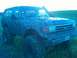 1990 Ford Bronco - This heavily modified 1990 Ford Bronco is caked in mud, oversized tires and a snorkel for off-road adventures.