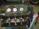 1957 Ford Custom Sedan - Close-up of an engine block, possibly undergoing rebuild or repair, with visible bearing surfaces.