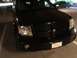 2007 Dodge Durango - Front view of a black 2007 Dodge Durango, its distinctive grille and headlights.