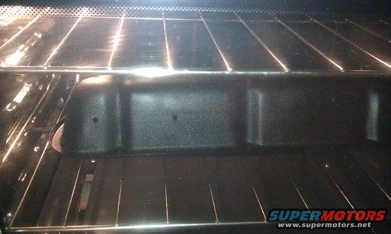 Valve covers being baked after sprayed with wrinkle paint. 200 degrees for 1 hour