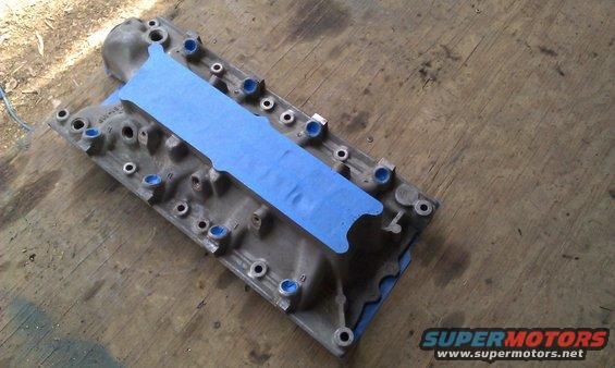 Lower intake manifold taped off and ready for paint