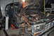1986 Ford Bronco - The engine bay of a 1986 Ford Bronco is visible with the hood open, revealing the engine and front grille.