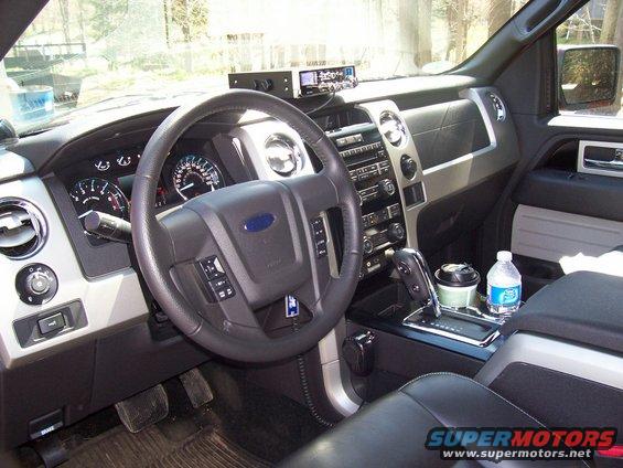Interior of a modern Ford F-150 truck, showing the dashboard, steering wheel, and center console