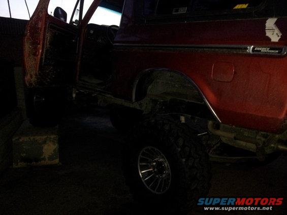 1978 Ford Bronco side view, driver door open, red paint