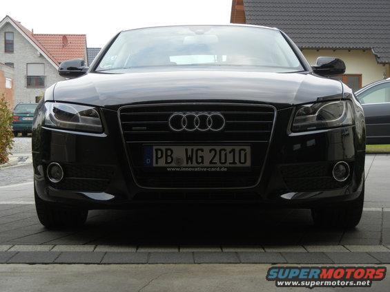 Front view of a black 2010 Audi A4 sedan with license plate PB WG 2010