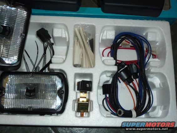 Fog lamps and wiring kit in packaging