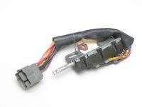 Ignition switch assembly with a gray multi-pin connector and a bundle of colored wires