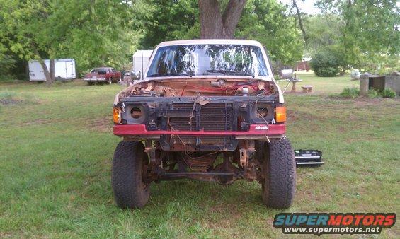 Front view of a disassembled truck with '4x4' badge visible