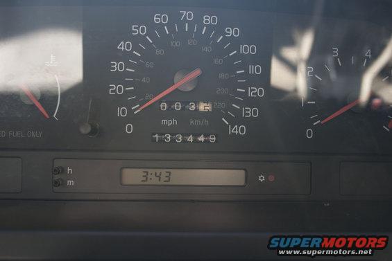 Dashboard gauges with odometer reading 133449 and clock showing 3:43