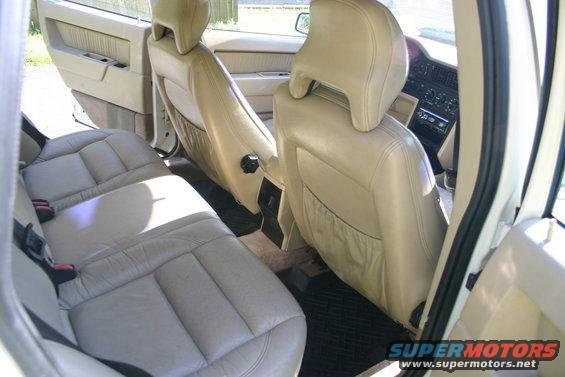 Beige leather interior rear seats and door panel