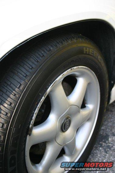 Silver Volvo wheel with 'VOLVO' text on center cap, 1997