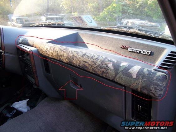 1989 Ford Bronco interior dashboard with camouflage trim and XLT Bronco badge