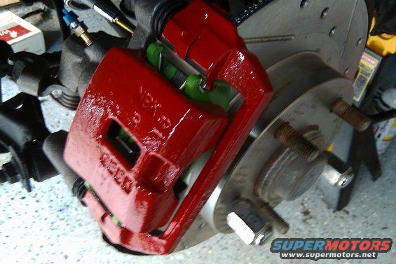 Painted rear calipers with Green Stuff brake pads. 